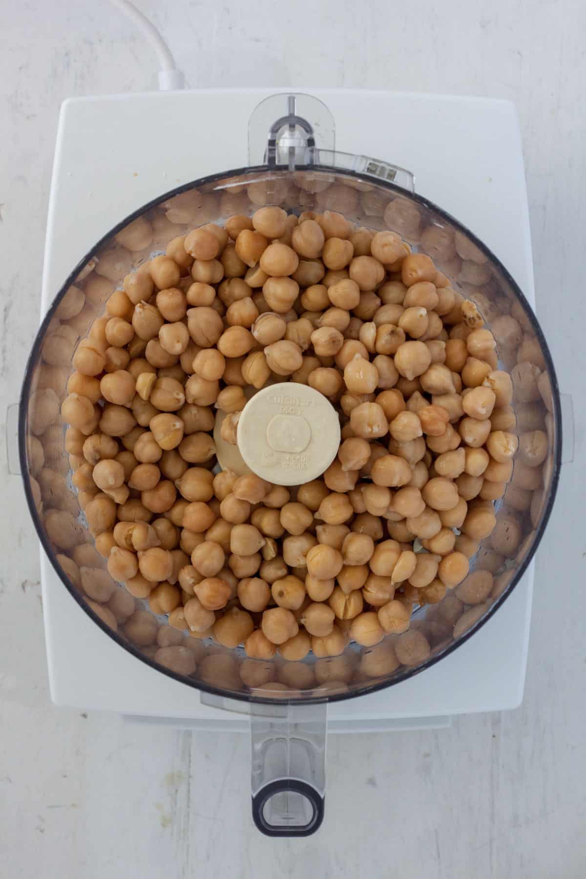 Chickpea in the base of a food processor.