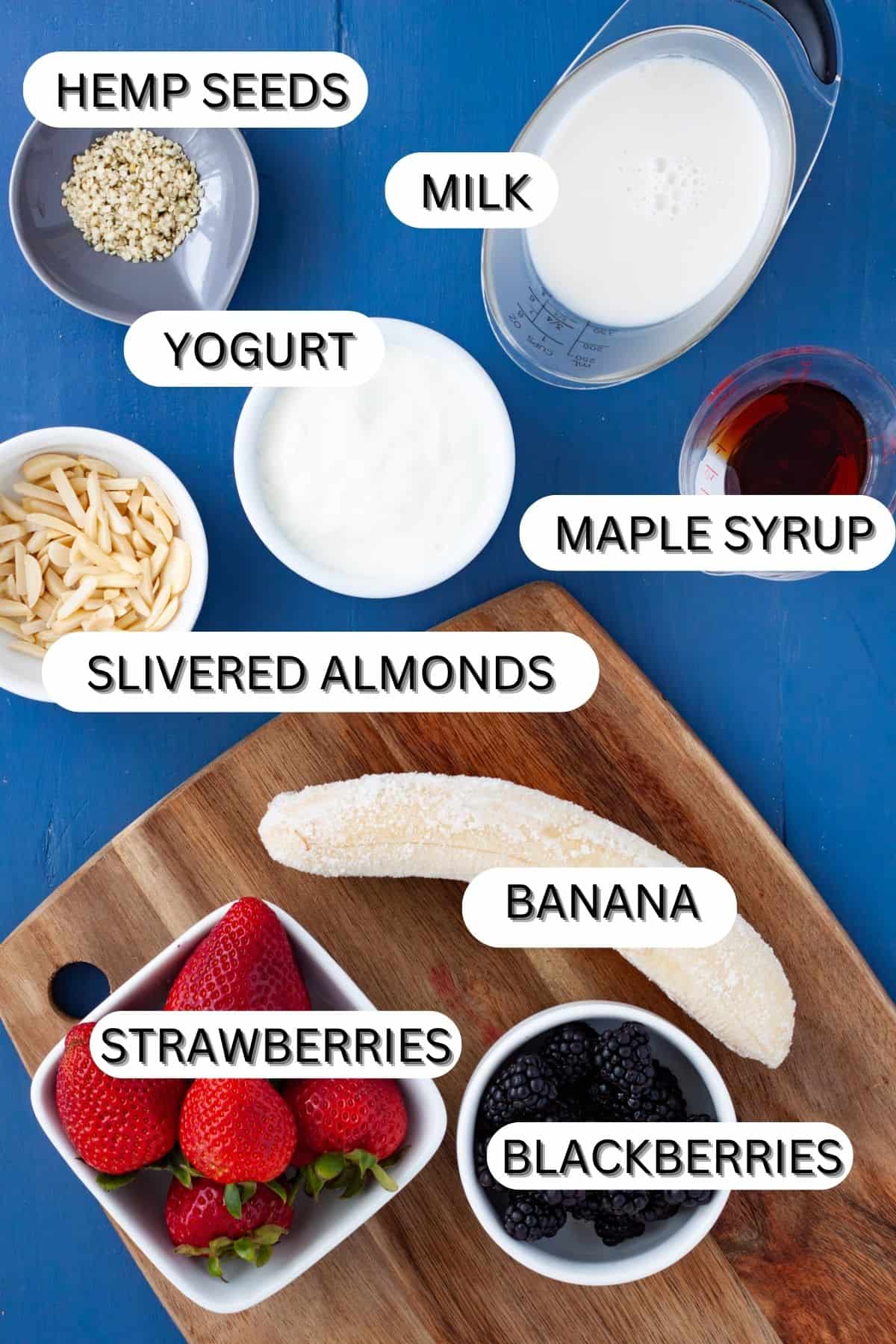 Ingredients for a blackberry strawberry banana smoothie.