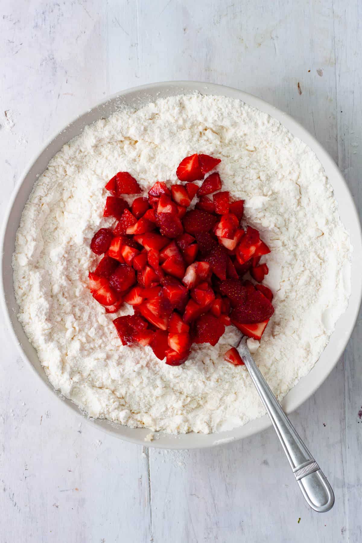 Chopped strawberries added to the base for biscuit batter.