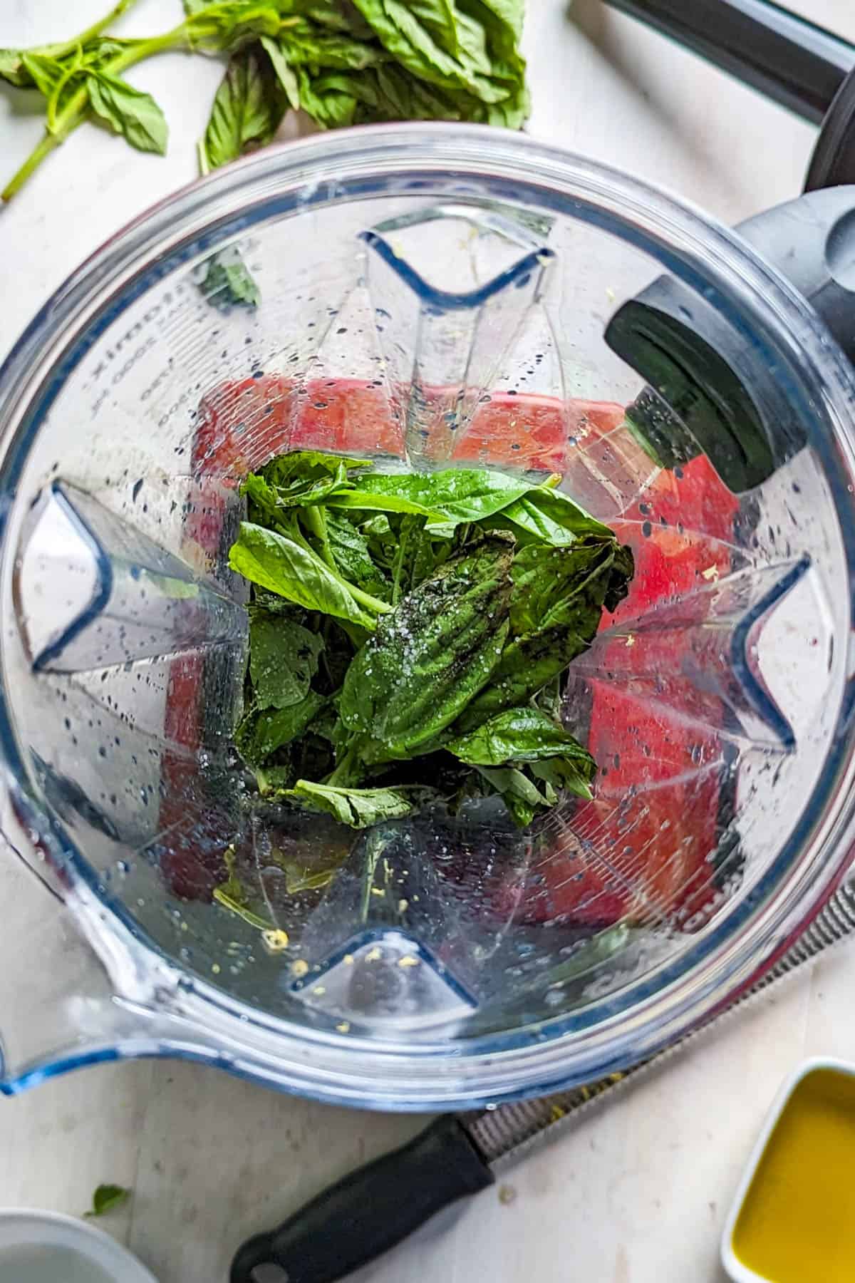 Ingredients for basil vinaigrette in a blender.