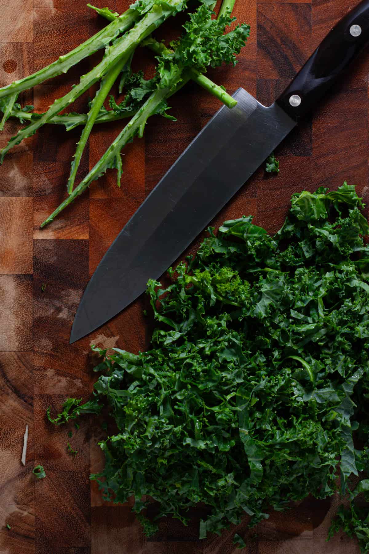 Kale getting chopped for a kale and apple slaw.