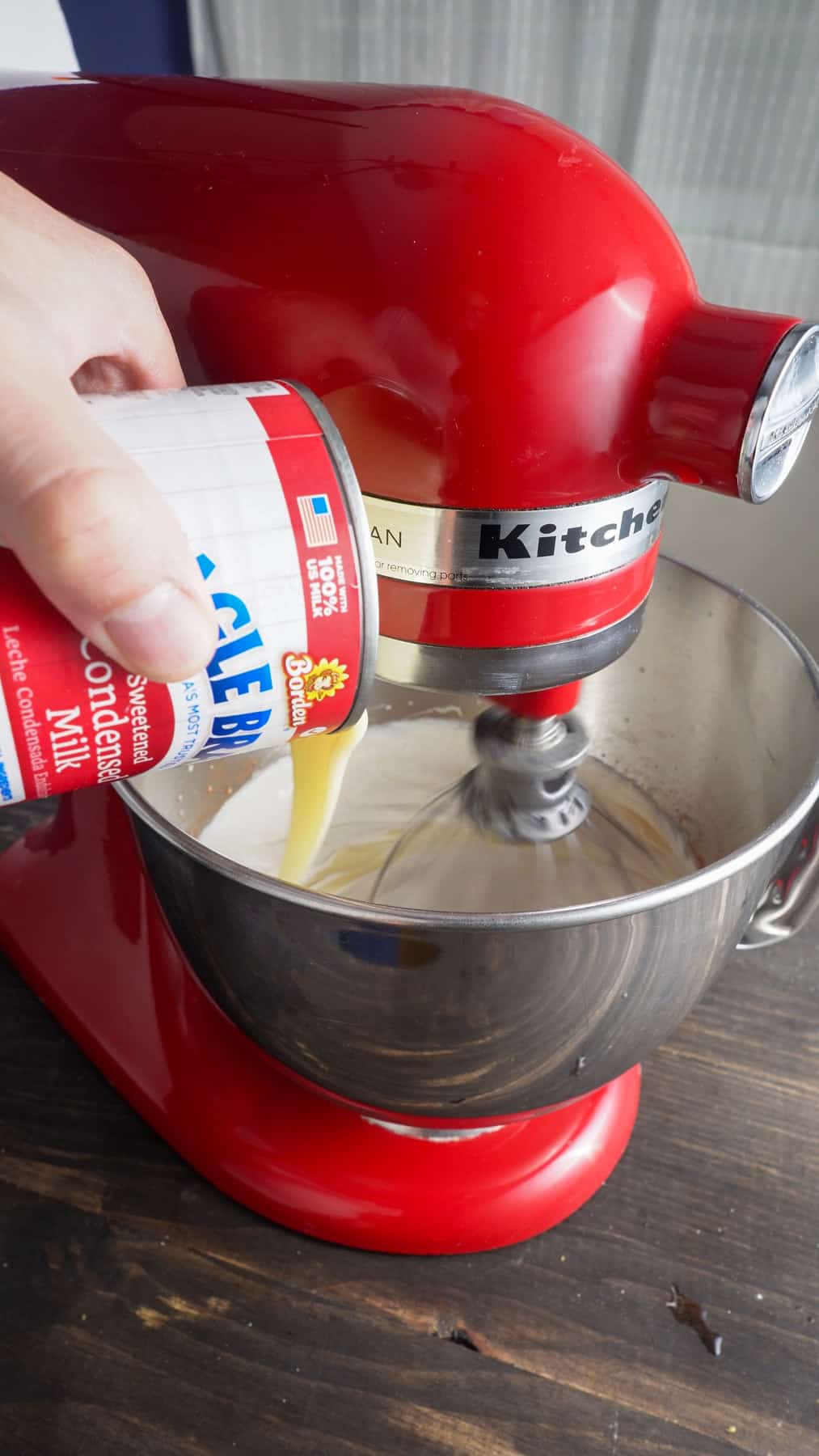 Sweetened condensed milk getting added to the base of no-churn cider donut ice cream.