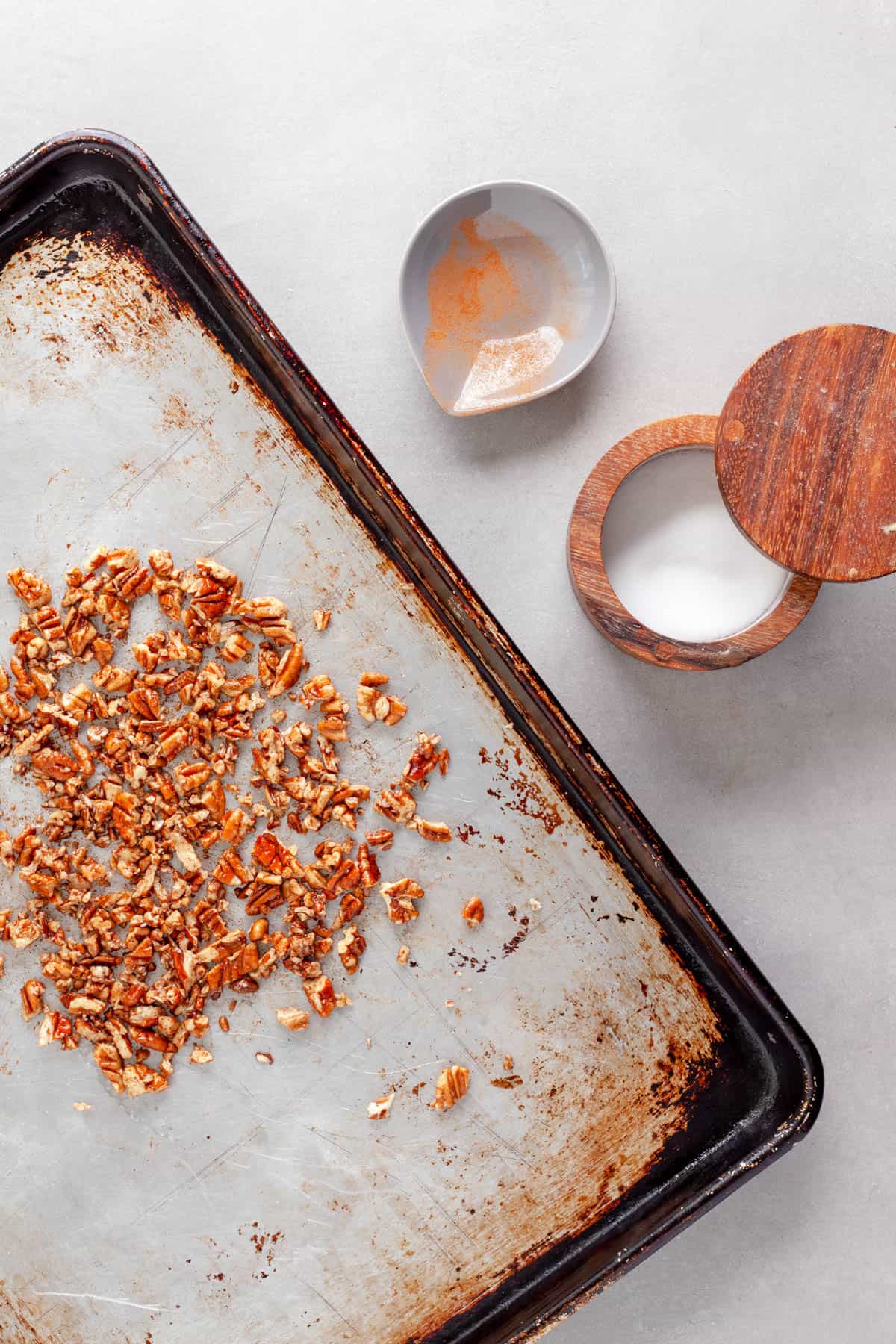 Chopped pecans tossed with olive oil, maple syrup, cinnamon and cayenne pepper for a salad topper.
