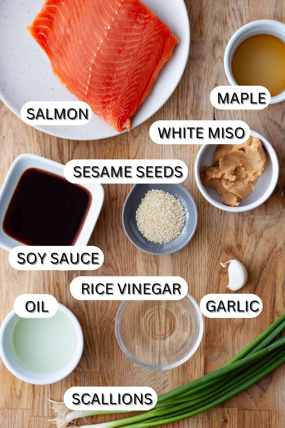 Ingredients for miso salmon on a butcherblock countertop.