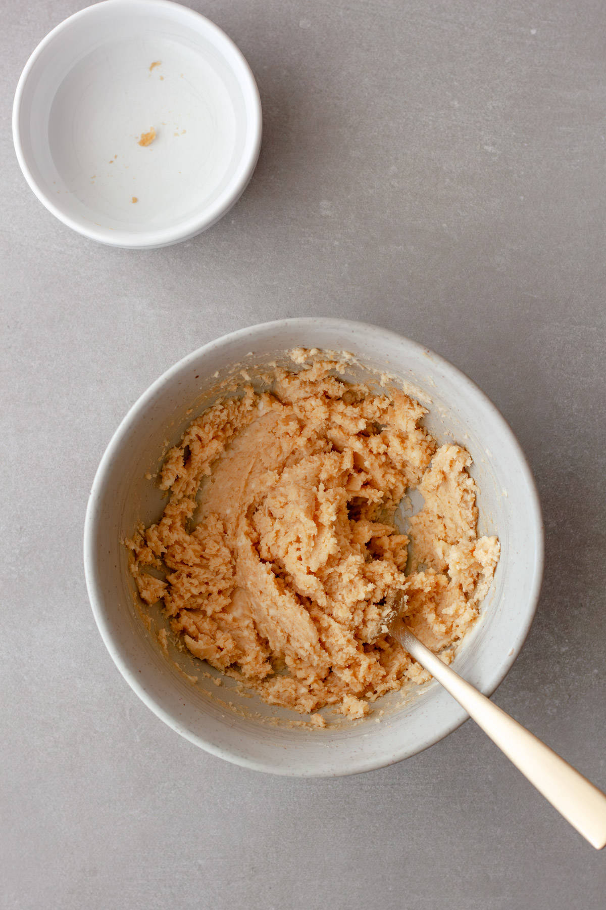 Miso butter combined in a gray bowl for a fork.