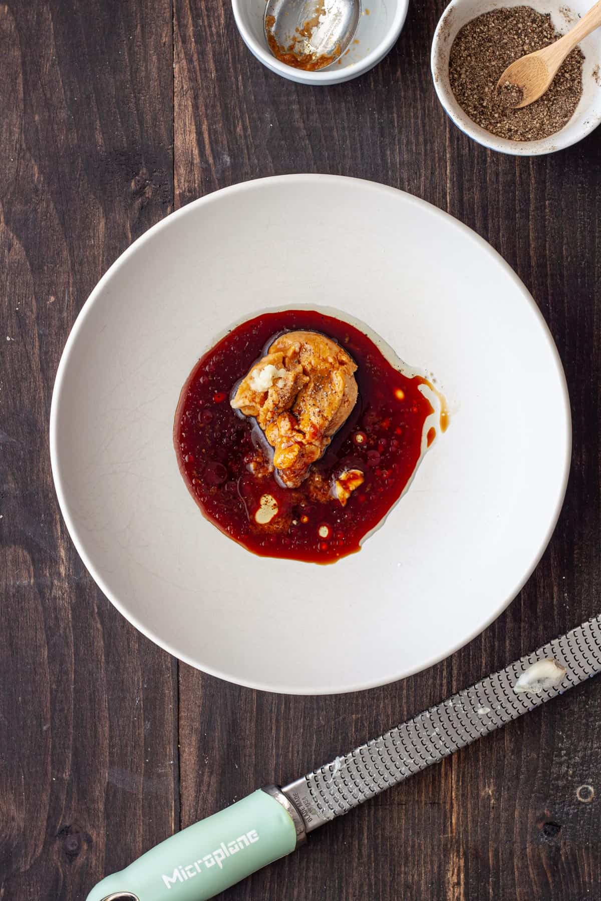Marinade for miso roasted cauliflower in a white bowl.