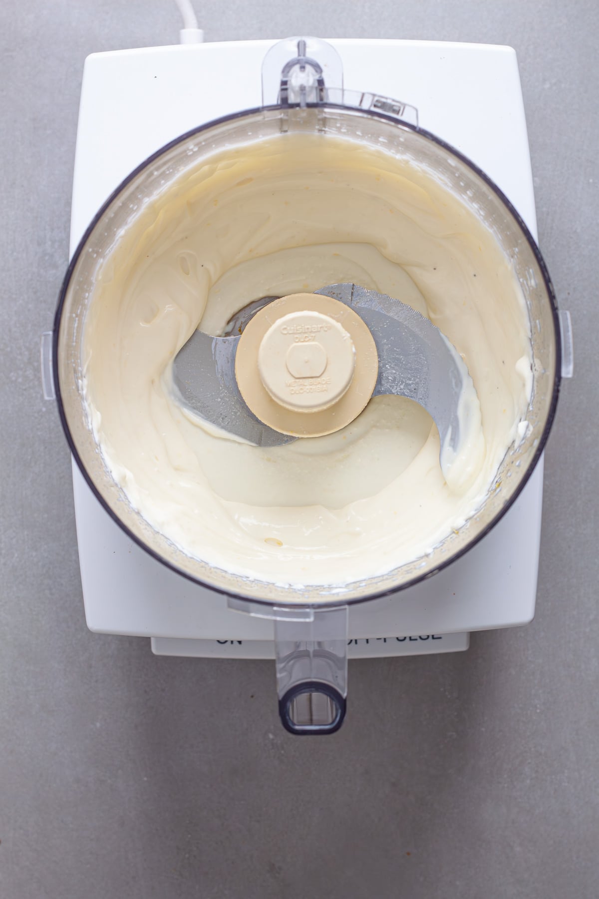 Whipped ricotta cheese in a food processor.