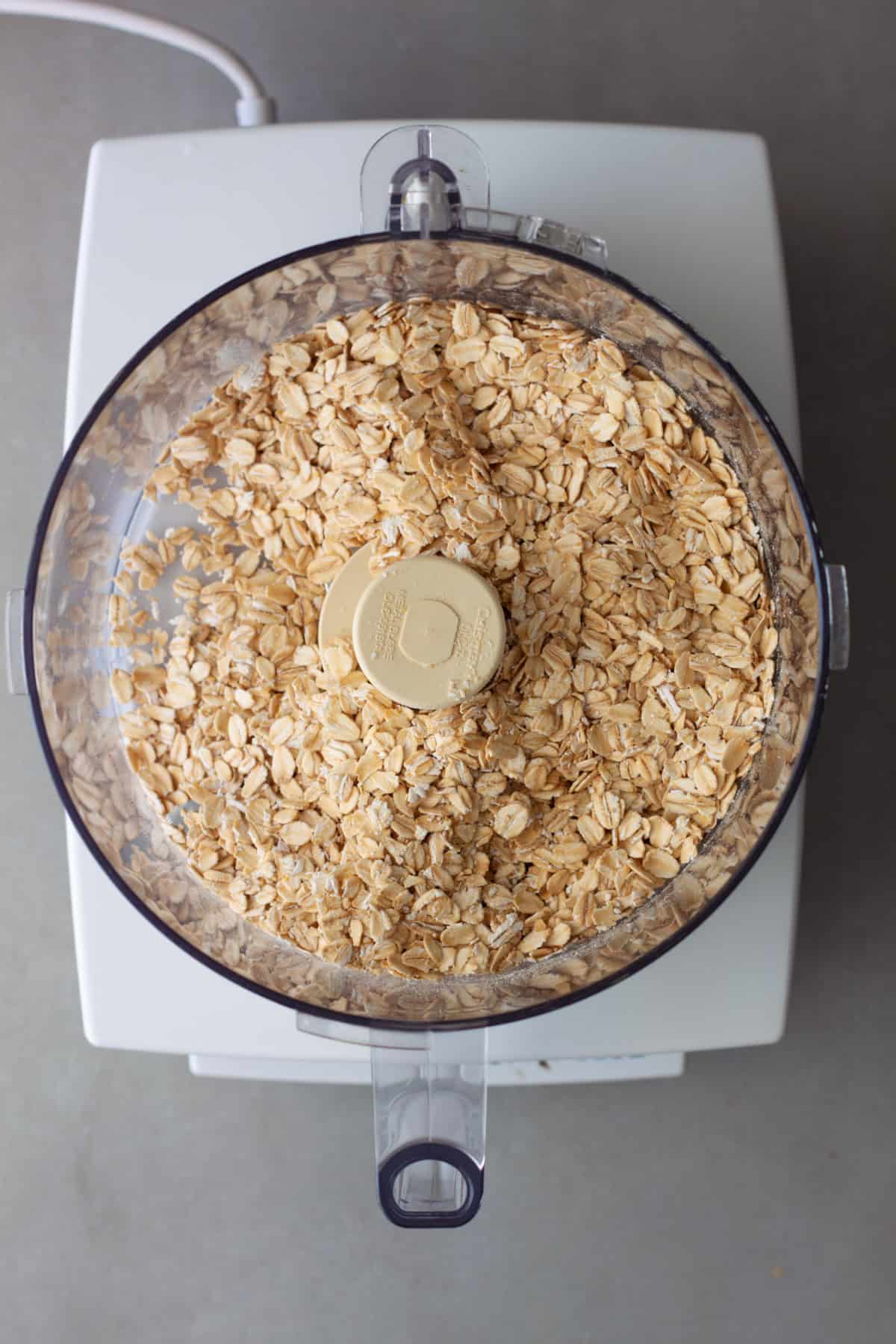 Rolled oats in the base of a food processor.
