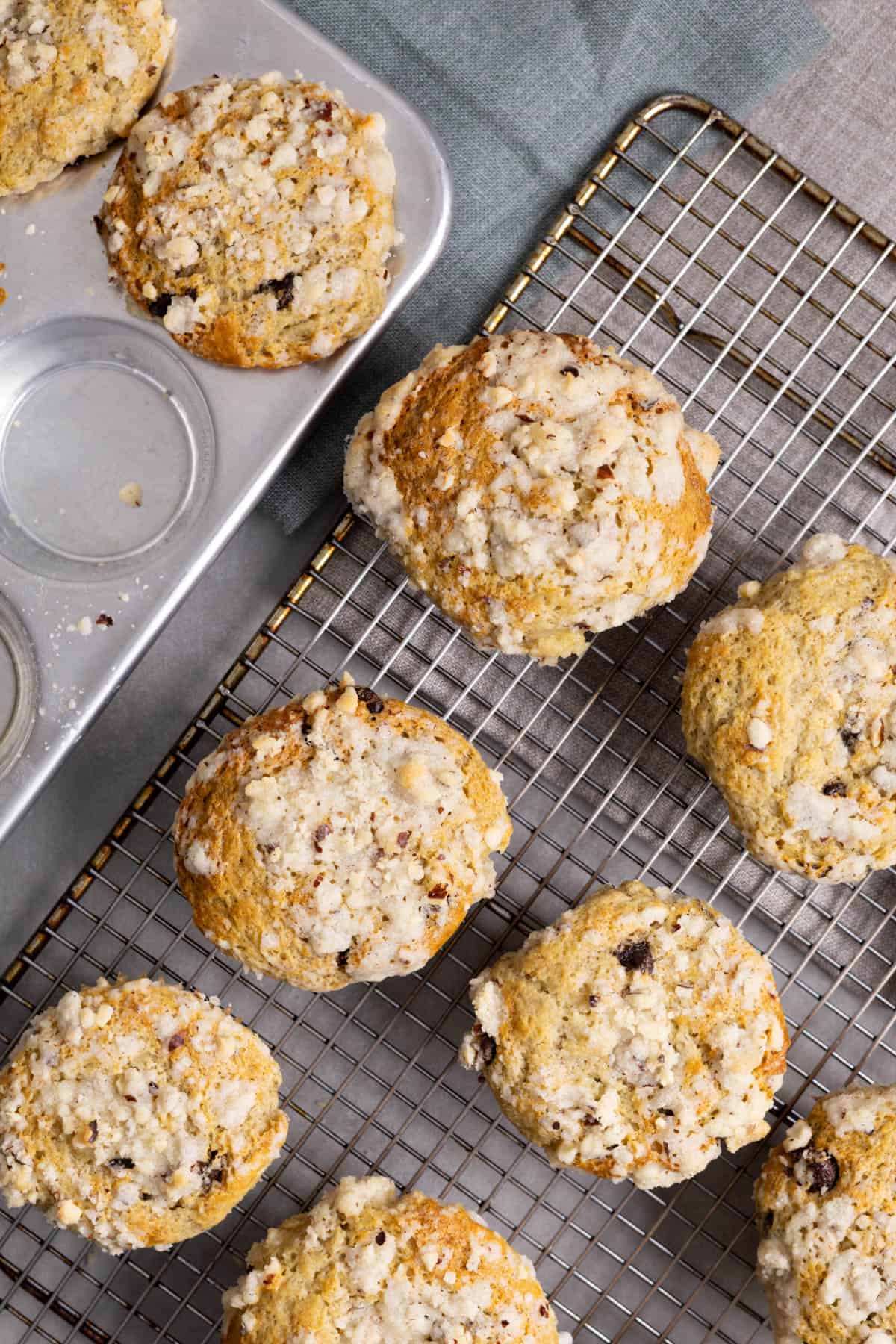 Nutella stuffed banana muffins on a wire rack cooling.
