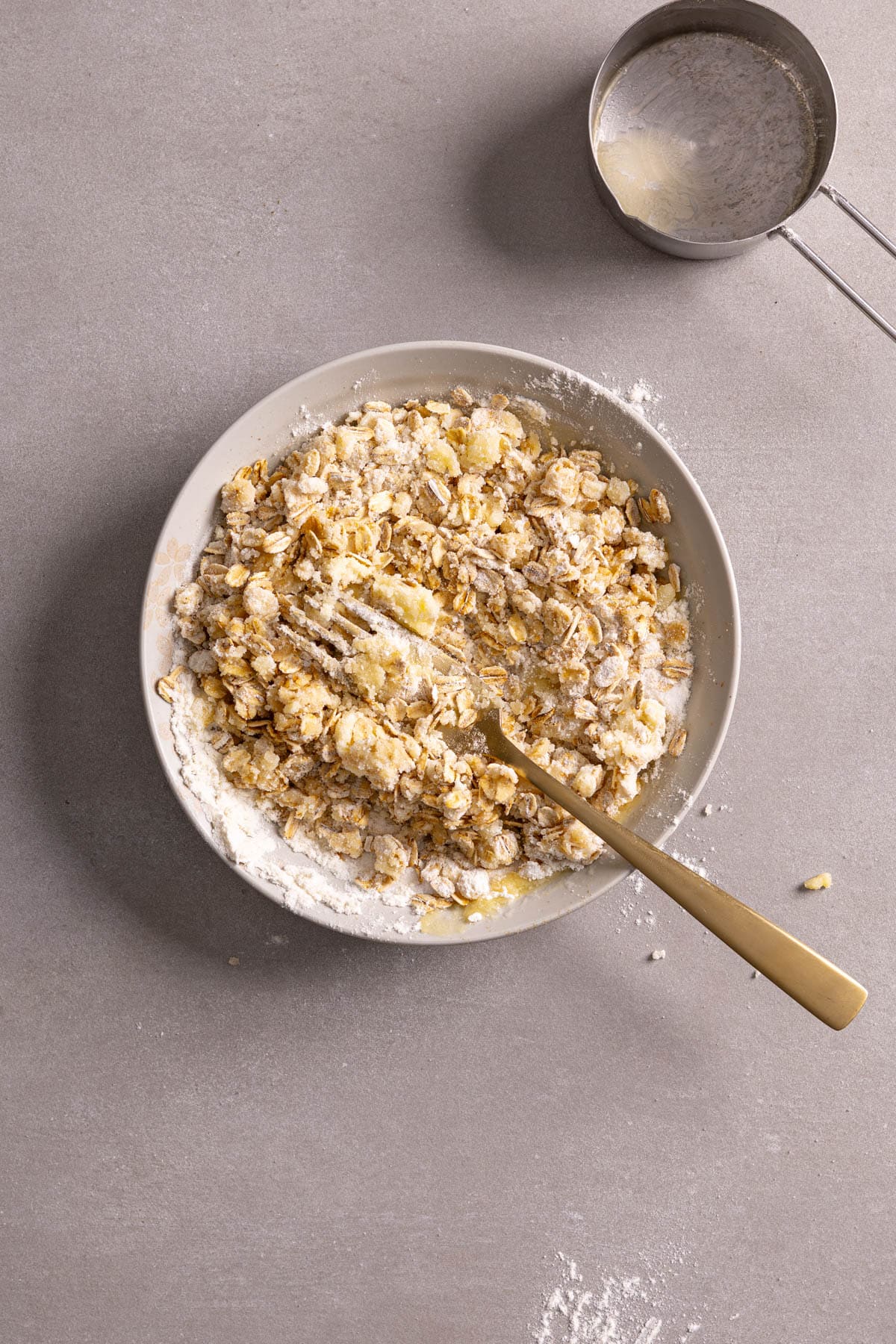 Streusel topping for muffins in a small bowl.